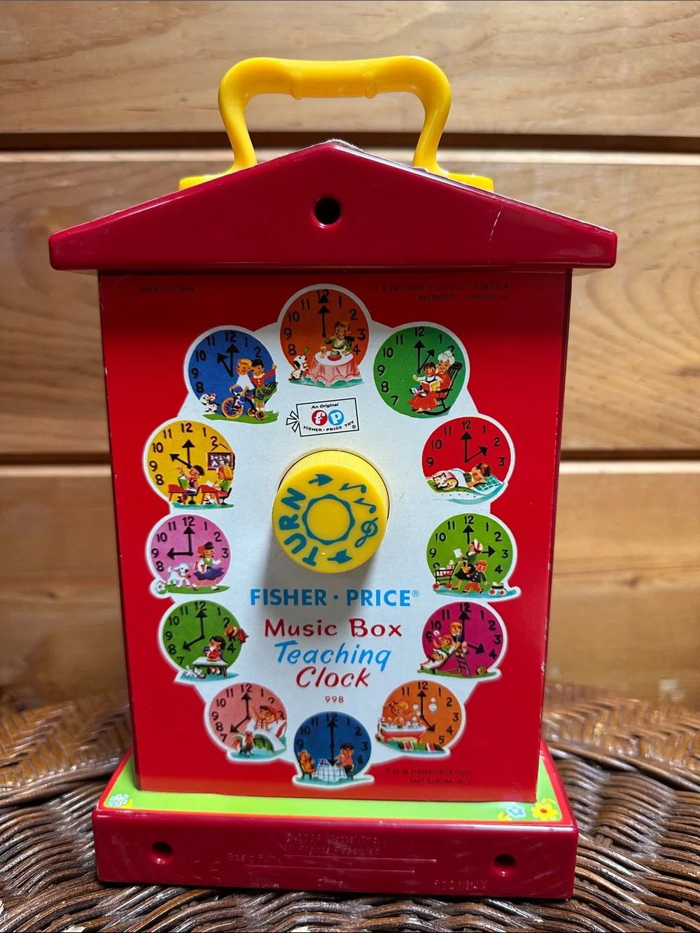 Modern Fisher-Price wind up clock